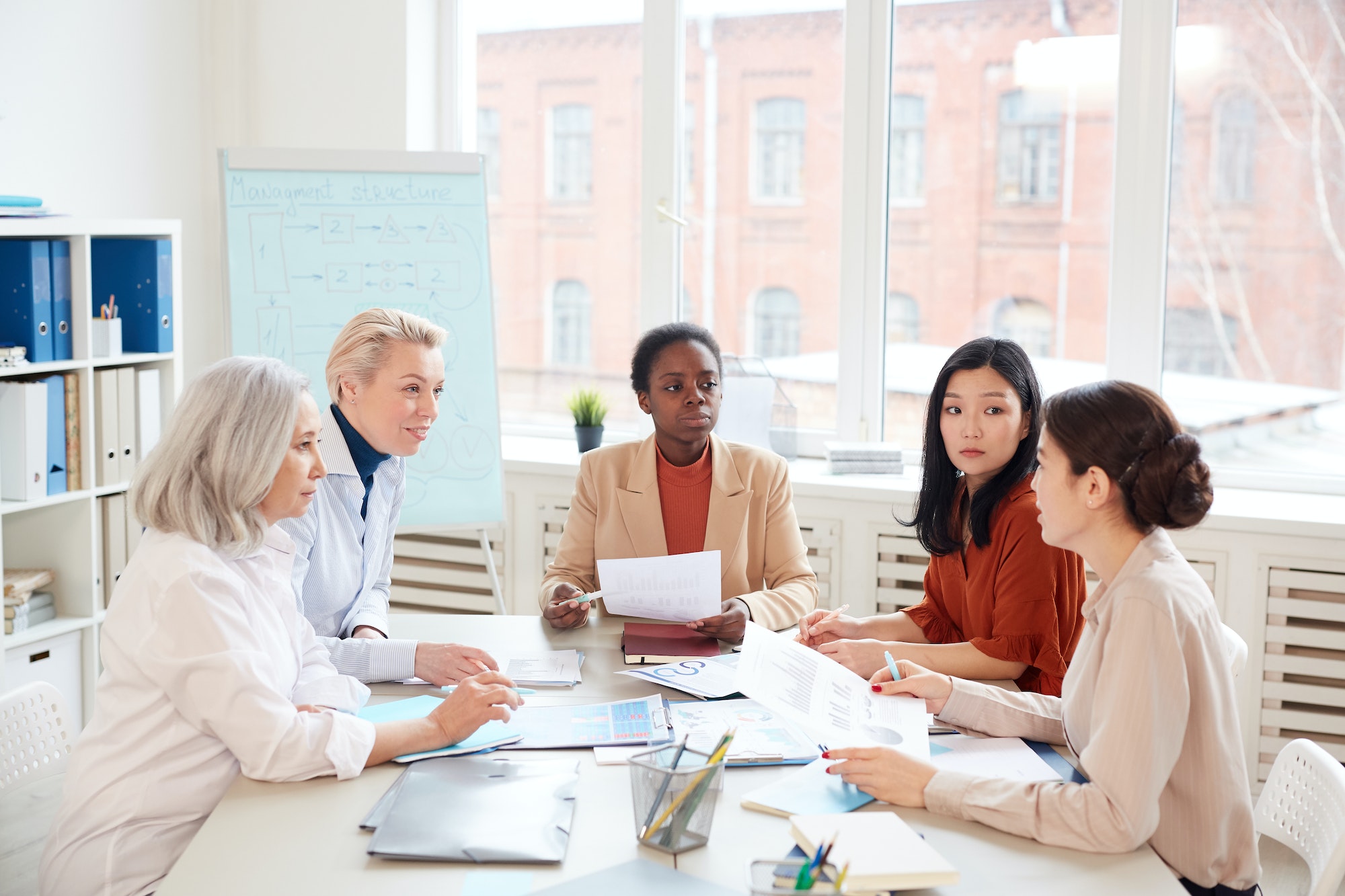 Group of Businesswomen at Meeting in Office